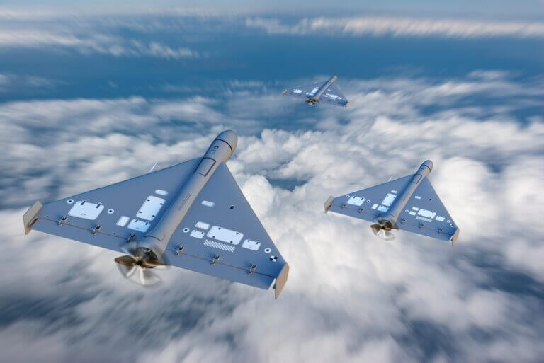 Military,Aviation,,Combat,Drones,Fly,Above,Clouds,During,Reconnaissance,Mission.